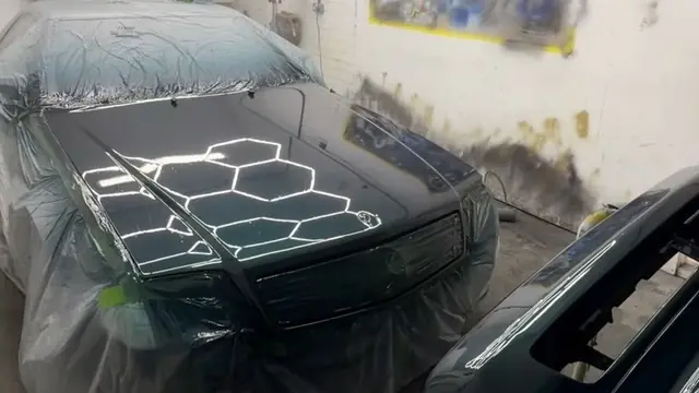 A Mercedes SL being refinished inside the Perfect Detail workshop in Balby