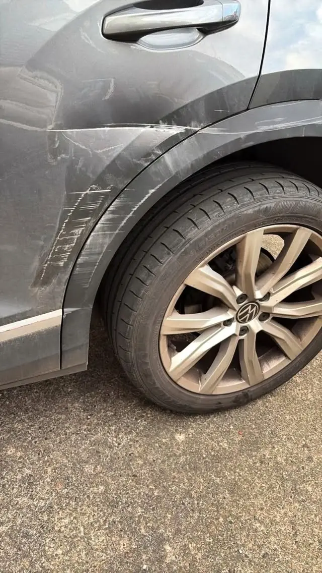 VW rear door crease and scuffs, before repair